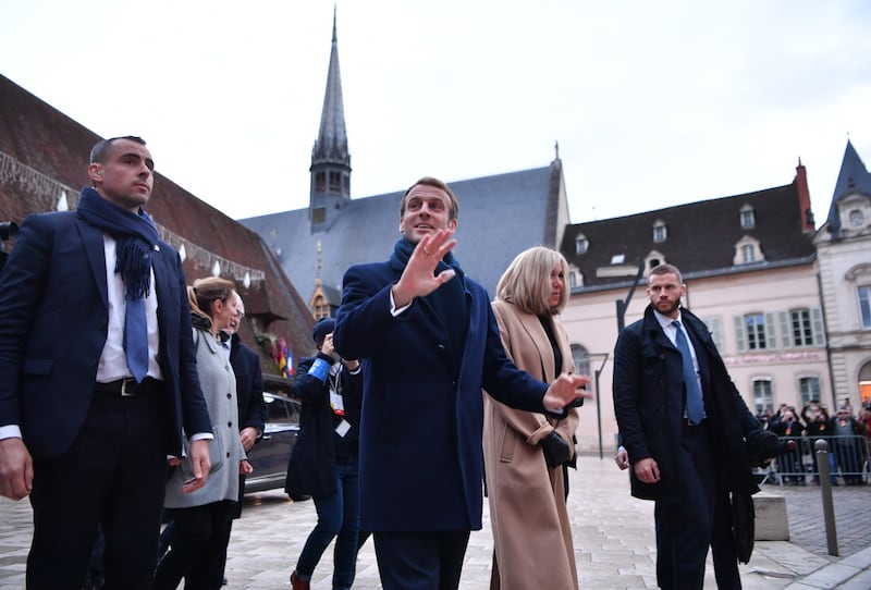 Emmanuel Macron and his wife Brigitte arrive in Beaune. EPA