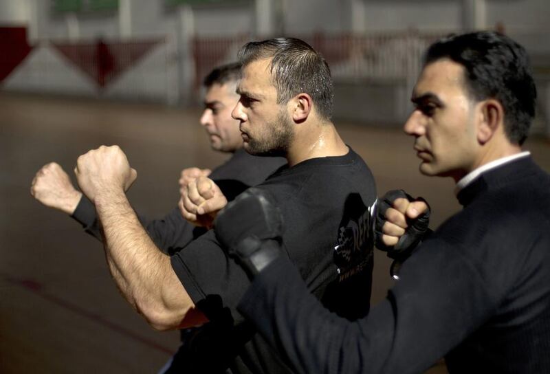 Private guards from Gaza’s first private security company Secure Land train in Gaza City. The newly-formed team of bodyguards mandate covers everything from minding VIPs like the Arabs Idol winner Mohammed Assaf, securing hotels and businesses to ensuring the safe delivery of cash in transit.