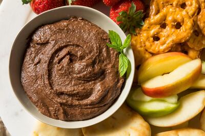 2A1CDJE Homemade Chocolate Dessert Hummus Dip with Apples and Naan. Alamy