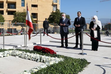  Lebanese Prime Minister-designate Saad Hariri (C) and Bahiya Hariri (R), the sister of the martyr former Prime Minister Rafik Hariri, pray at his grave, during the 16th anniversary of his assassination, in downtown Beirut, Lebanon,  February 14, 2021. Hariri was assassinated along with 14 other people when a massive explosion hit his motorcade in Beirut, Lebanon on  February 14, 2005. EPA