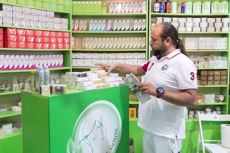 RAS AL KHAIMAH, UNITED ARAB EMIRATES - AUGUST 13, 2018. 

Sabri Al Majanini sells soap at Ras Al Khaima's Eid Al Adha fair.

(Photo by Reem Mohammed/The National)

Reporter: RUBA HAZA
Section:  NA