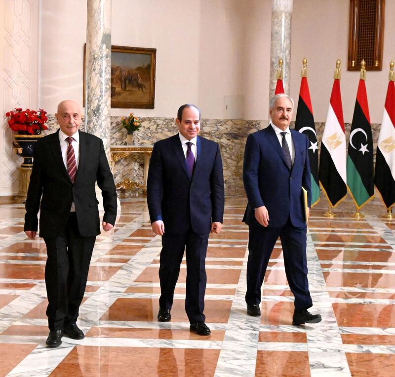 A handout picture released by the Egyptian Presidency on June 6, 2020 shows Egyptian President Abdel Fattah al-Sisi (C), Libyan commander Khalifa Haftar (R) and the Libyan Parliament speaker Aguila Saleh arriving for a joint press conference in the capital Cairo.  Haftar has backed a ceasefire in Libya starting Monday, Egypt's president announced after talks in Cairo, following a series of military victories by the country's UN-recognised government. - === RESTRICTED TO EDITORIAL USE - MANDATORY CREDIT "AFP PHOTO / HO / EGYPTIAN PRESIDENCY' - NO MARKETING NO ADVERTISING CAMPAIGNS - DISTRIBUTED AS A SERVICE TO CLIENTS ==
 / AFP / EGYPTIAN PRESIDENCY / - / === RESTRICTED TO EDITORIAL USE - MANDATORY CREDIT "AFP PHOTO / HO / EGYPTIAN PRESIDENCY' - NO MARKETING NO ADVERTISING CAMPAIGNS - DISTRIBUTED AS A SERVICE TO CLIENTS ==
