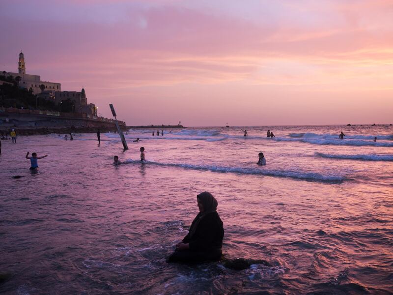 Palestinians spend the day on the beach during the Eid Al Fitr holiday. AP Photo