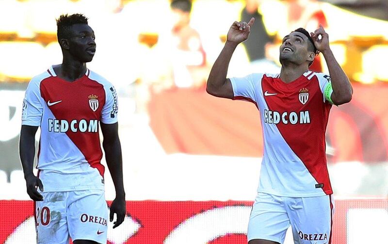 Radamel Falcao, right, celebrates after opening the scoring for Monaco in the 3-0 Ligue 1 victory over Rennes. Valery Hache / AFP

