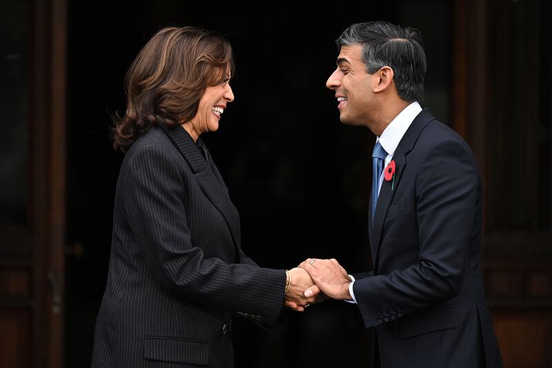 British Prime Minister Rishi Sunak greets US Vice President Kamala Harris on the second day of the UK's Artificial Intelligence Safety Summit at Bletchley Park. Getty Images