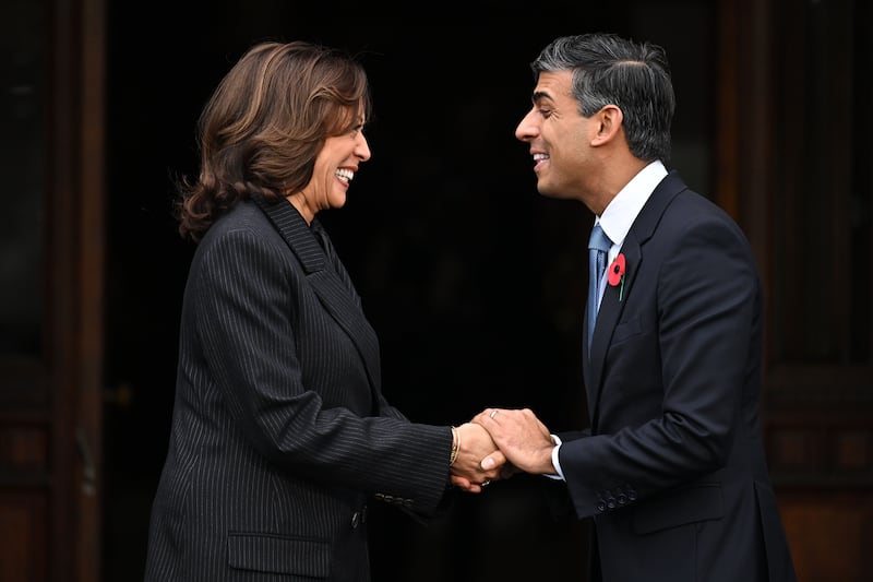 British Prime Minister Rishi Sunak greets US Vice President Kamala Harris on the second day of the UK's Artificial Intelligence Safety Summit at Bletchley Park. Getty Images