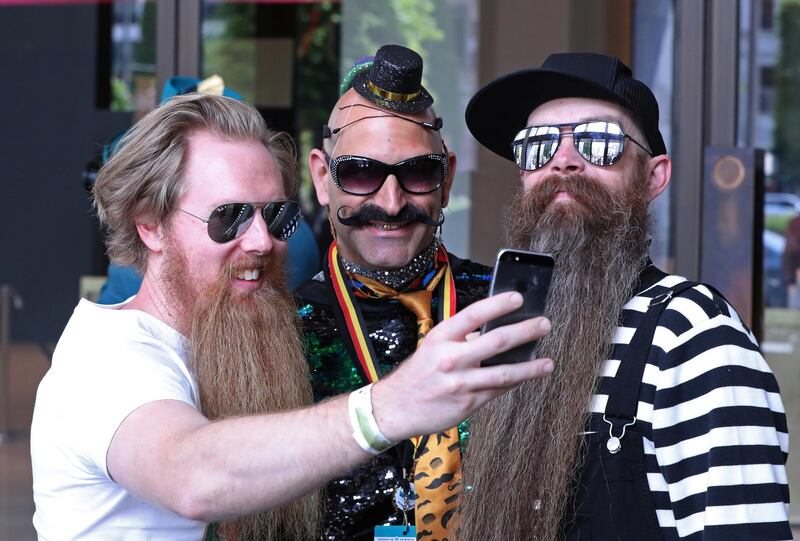 People take part in the international World Beard and Moustache Championships in Antwerp, Belgium.  Reuters