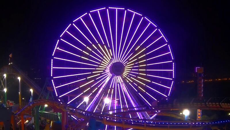 This photo provided by Pacific Park on the Santa Monica, Calif., Pier shows their Ferris wheel in Los Angeles Lakers purple and gold colors with Kobe Bryant's No. 24 in honor of the former Lakers star who died with several others in a helicopter crash in Southern California.  AP