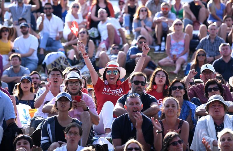 LONDON, ENGLAND - JULY 12: Fans watch on from Henman Hill during Day eleven of The Championships - Wimbledon 2019 at All England Lawn Tennis and Croquet Club on July 12, 2019 in London, England. (Photo by Laurence Griffiths/Getty Images)