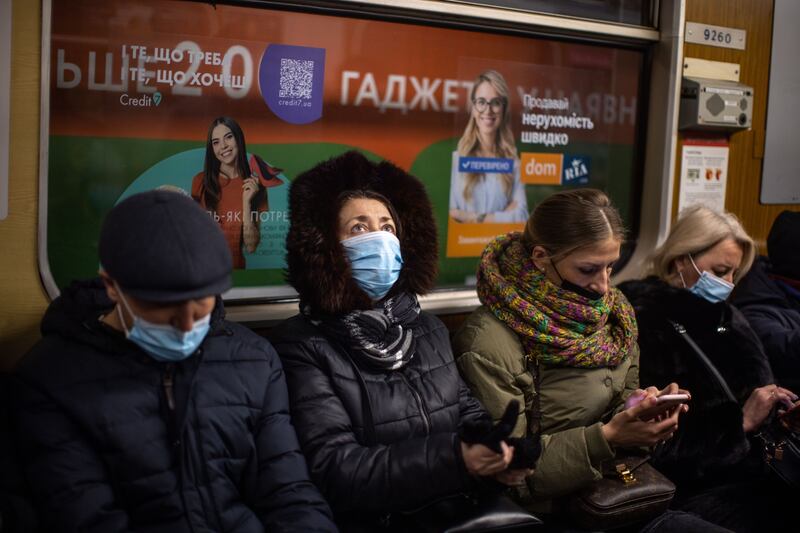 Passengers travel on a train in Kiev. Ukrainians have gone back to work, but are “not naive to the fact of how serious the situation is”, reports say. Bloomberg