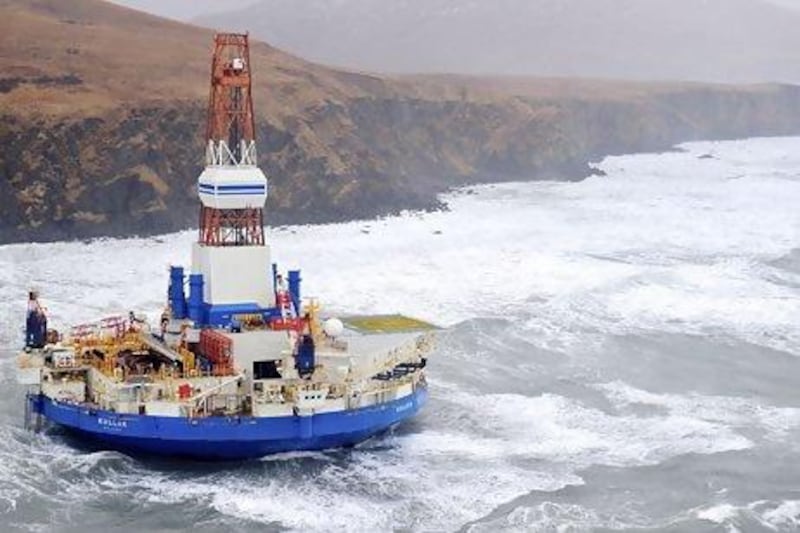 Last week, Shell's drill-ship Kulluk broke loose from its tug boats and grounded on an island south of Alaska. US Coast Guard / AP Photo