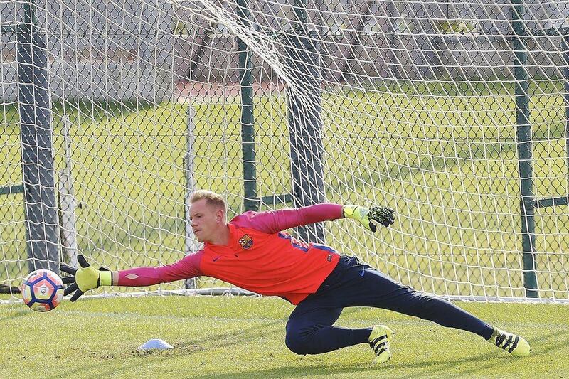 Marc Andre Ter Stegen makes a save during the training session. Alejandro Garcia / EPA