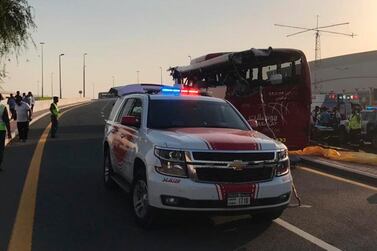 The aftermath of a bus crash in Dubai in which 17 passengers died. Dubai Police / AP