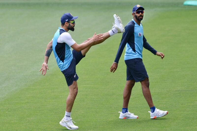 Virat Kohli does stretching exercises during a training session at the Adelaide Oval. AFP