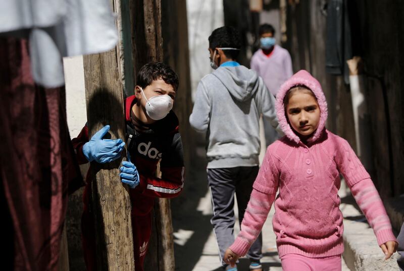 Palestinian children play at the al-Shati refugee camp in Gaza City amid the coronavirus pandemic.  AFP