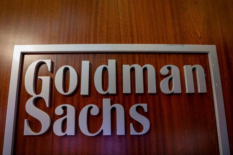 FILE PHOTO: The Goldman Sachs company logo is seen in the company's space on the floor of the New York Stock Exchange, (NYSE) in New York, U.S., April 17, 2018. REUTERS/Brendan McDermid/File Photo