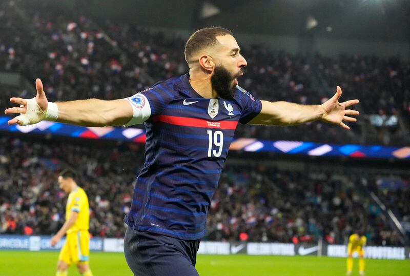 France's Karim Benzema celebrates after scoring his side's fourth goal. AP