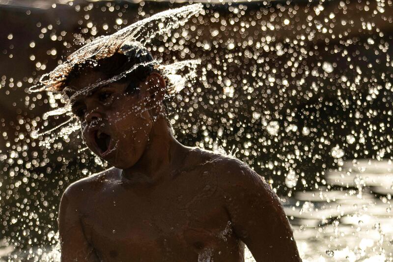 A boy cools off in the Shatt Al Arab waterway.