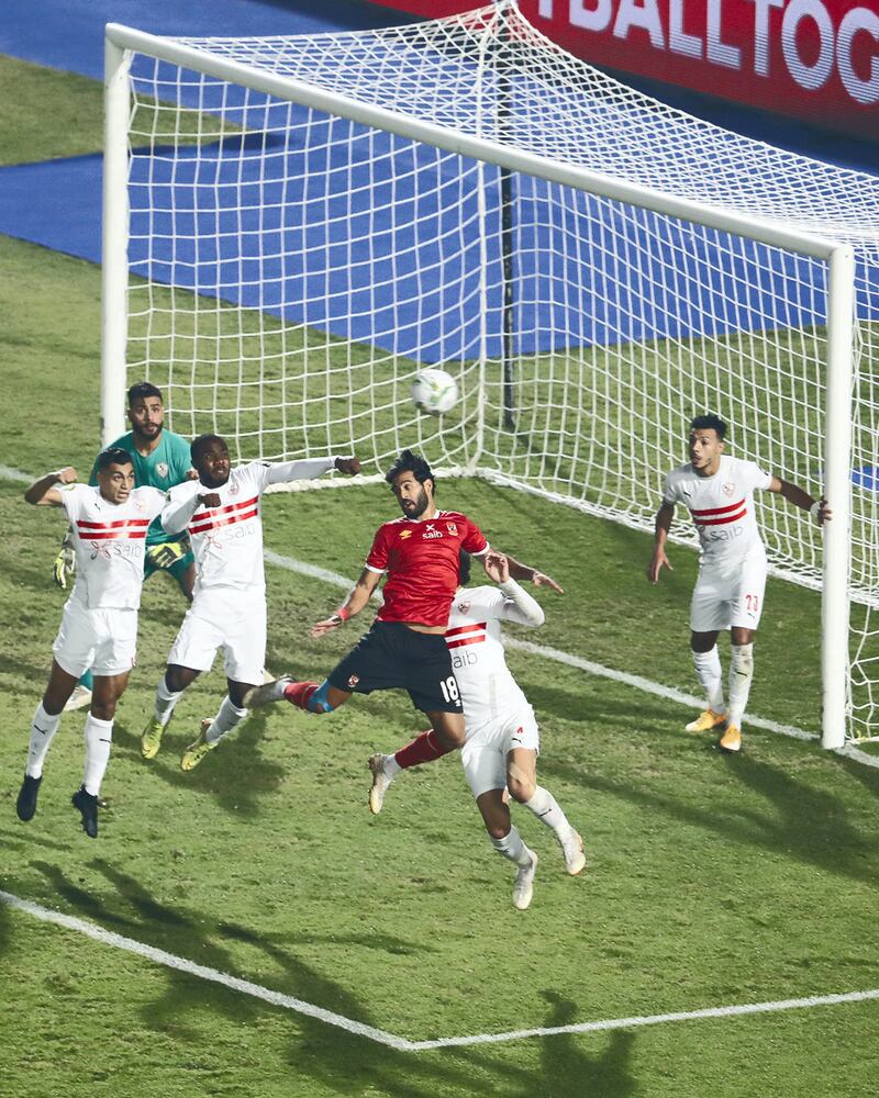 Ahly's forward Marwan Mohsen jumps for the header during the CAF Champions League Final football match between Egyptian sides Zamalek and Al-Ahly at the Cairo International Stadium in Egypt's capital on November 27, 2020. (Photo by Khaled DESOUKI / AFP)