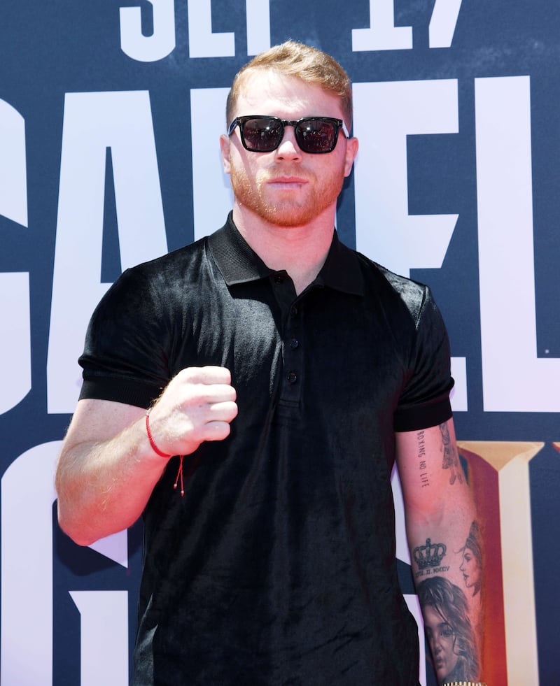 Boxer Canelo Alvarez poses on the red carpet. AFP
