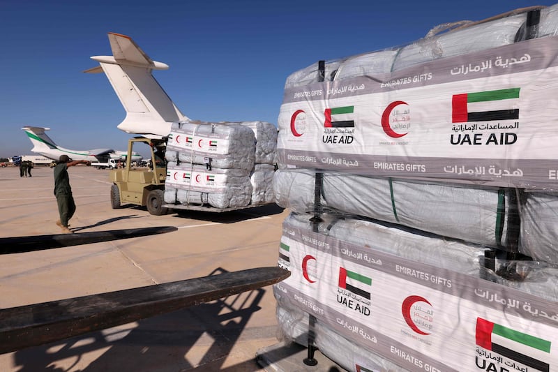 UAE aid for survivors of the fatal floods is unloaded at the airport in Benghazi. AFP
