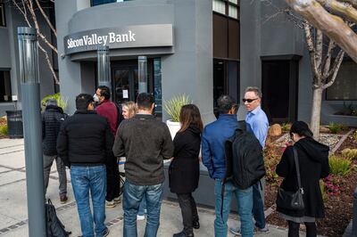 Customers queue outside the offices of Silicon Valley Bank in Santa Clara, California, on Monday, days after the lender collapsed. Bloomberg