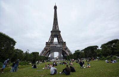 British travellers visiting French attractions such as the Eiffel Tower in Paris will have to quarantine on their return. AP 