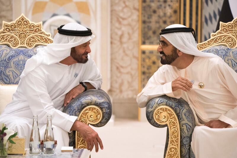 ABU DHABI, UNITED ARAB EMIRATES - May 20, 2018: HH Sheikh Mohamed bin Zayed Al Nahyan Crown Prince of Abu Dhabi Deputy Supreme Commander of the UAE Armed Forces (L), speaks with HH Sheikh Mohamed bin Rashid Al Maktoum, Vice-President, Prime Minister of the UAE, Ruler of Dubai and Minister of Defence (R), during an iftar reception at the Presidential Palace. 

( Hamad Al Kaabi / Crown Prince Court - Abu Dhabi )
---