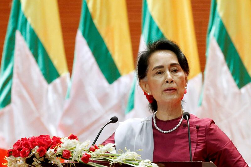 FILE PHOTO: Myanmar State Counselor Aung San Suu Kyi delivers a speech to the nation over the Rakhine and Rohingya situation, in Naypyitaw, Myanmar September 19, 2017. REUTERS/Soe Zeya Tun/File Photo