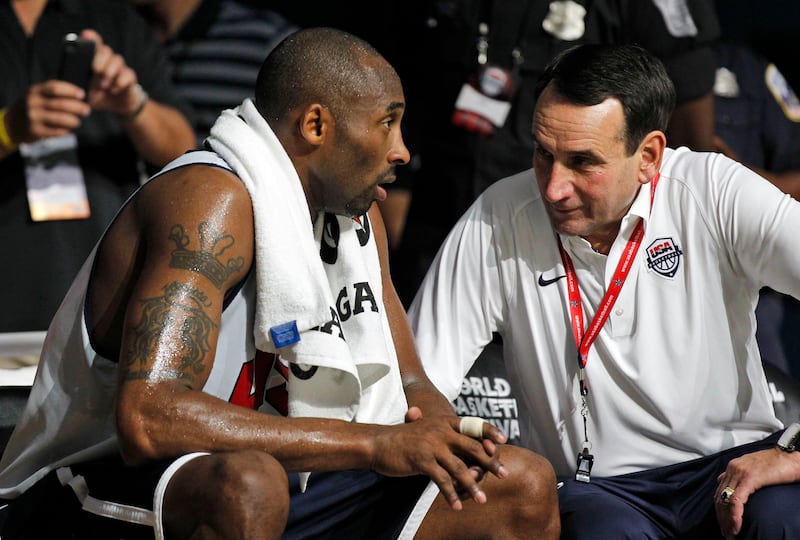 Bryant talks with USA Basketball head coach Mike Krzyzewski during an Olympic team practice. AP