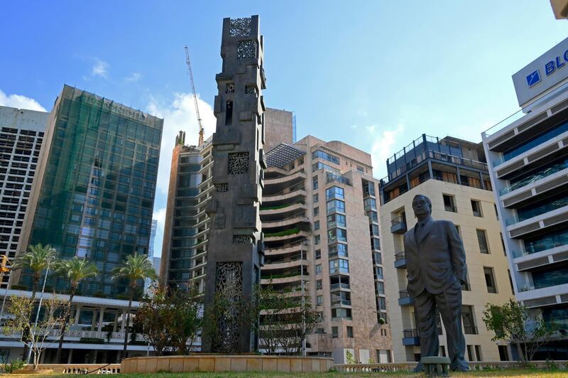 epa09248389 A statue of assassinated former Lebanese Prime Minister Rafik Hariri stands at the site of the 2005 explosion in Beirut, Lebanon, 04 June 2021. According to reports the Special Tribunal for Lebanon, investigating the assassination of former Lebanese Prime Minister Rafik Hariri and 21 others, it is facing a severe funding crisis will not be able to operate beyond July 2021.  EPA/WAEL HAMZEH