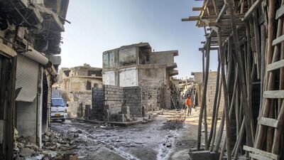 Reconstruction amidst carnage in the old city of Mosul. Haider Husseini/ The National