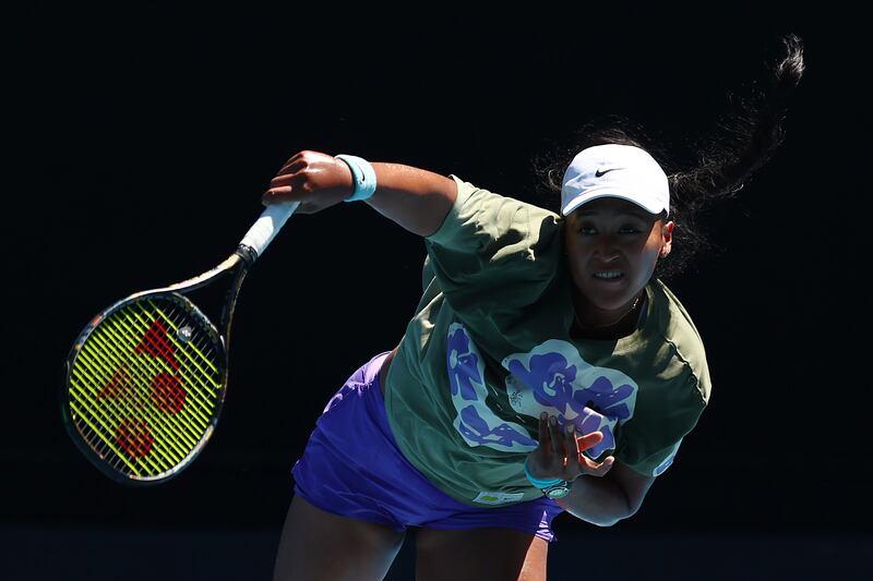 Naomi Osaka serves during a training session ahead of the 2024 Australian Open at Melbourne Park. Getty