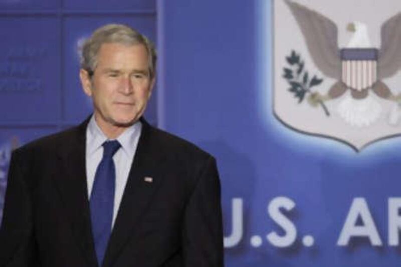 The US president Mr Bush pauses as he is introduced by Maj Gen Robert Williams, not shown, Wednesday, Dec 17 2008, in Thorpe Hall at the US Army War College in Carlisle, Pa.