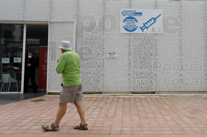 Tourists arrive at the mobile vaccination point installed by Spain's Valencia Health Ministry in Benidorm. Reuters