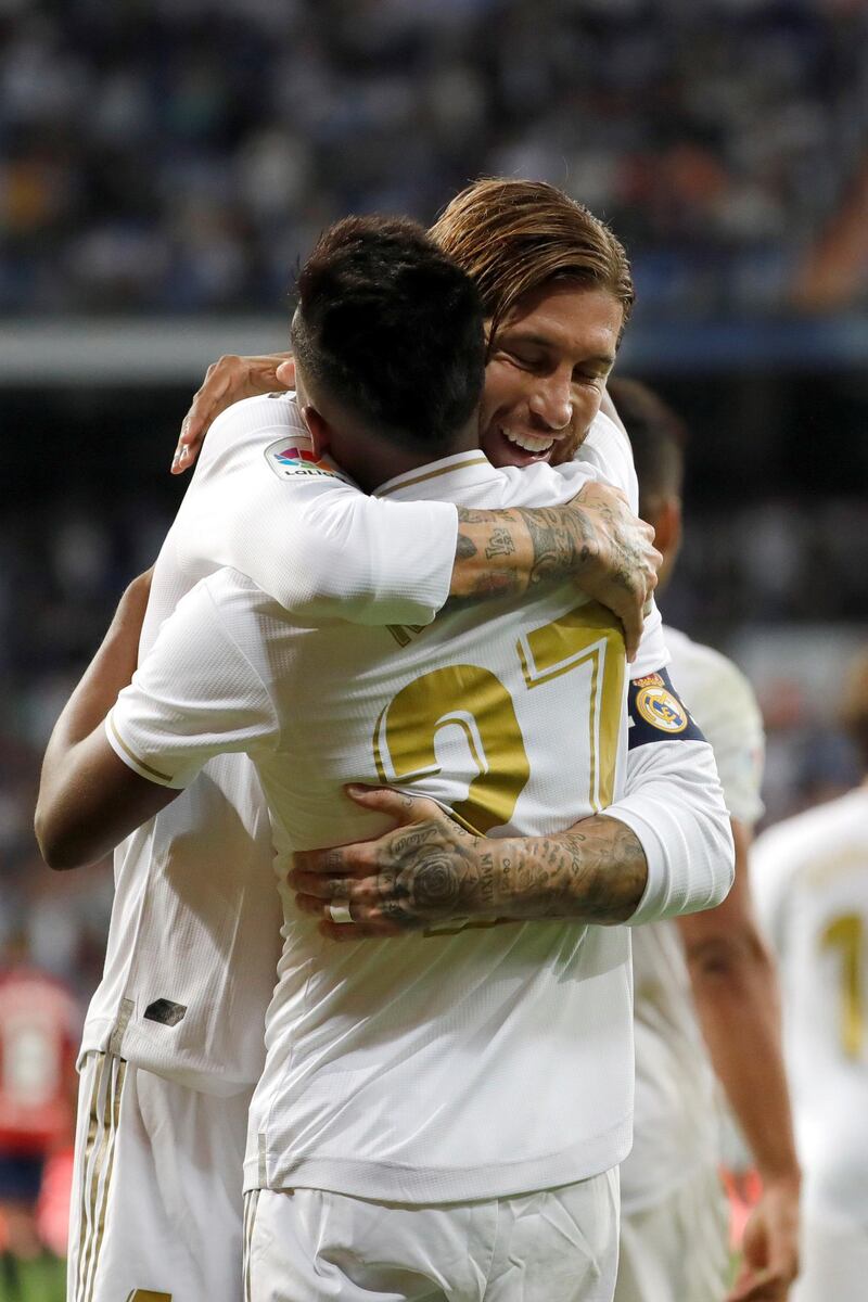 Real Madrid forward Rodrygo celebrates with teammate Sergio Ramos. EPA