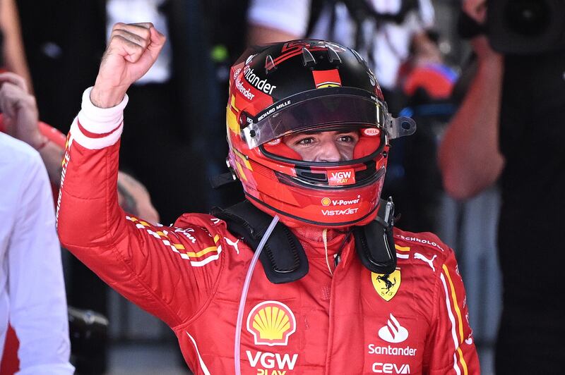 Carlos Sainz celebrates after winning the Australian Grand Prix. EPA