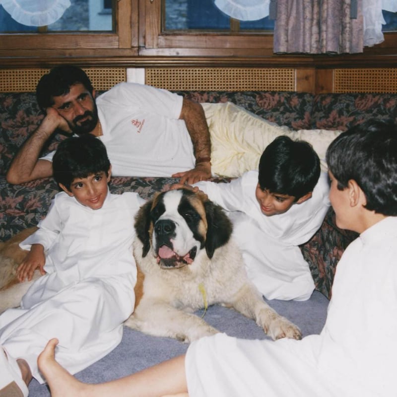 Sheikh Mohammed bin Rashid Al Maktoum is the Vice President and Prime Minister of the United Arab Emirates, and ruler of the Emirate of Dubai, with the family dog. Courtesy Sheikh Hamdan bin Mohammed bin Rashid Al Maktoum