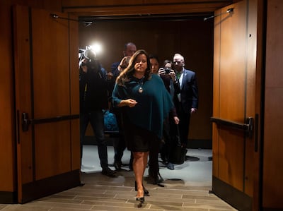 Ex-justice minister and ex-attorney general Jody Wilson-Raybould leaves the Justice committee in Ottawa, Ontario, Wednesday, Feb. 27, 2019. Wilson-Raybould testified Wednesday she experienced a consistent and sustained effort by many people in Prime Minister Justin Trudeau's government to inappropriately interfere in the prosecution of a major Canadian engineering company, including receiving "veiled threats." (Adrian Wyld/The Canadian Press via AP)