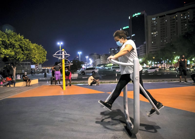 DUBAI, UNITED ARAB EMIRATES. 2 JUNE 2020. A woman exercising in a park by Dubai Creek in Baniyas, Deira.(Photo: Reem Mohammed/The National)Reporter:Section: