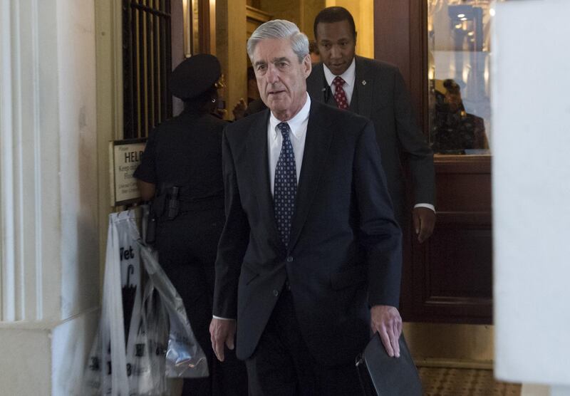 (FILES) In this file photo taken on June 21, 2017 former FBI Director Robert Mueller, special counsel on the Russia investigation, leaves following a meeting with members of the US Senate Judiciary Committee at the US Capitol in Washington. An explosive report from BuzzFeed News alleging that US President Donald Trump directed his lawyer to lie to Congress is "not accurate," a spokesman for Special Counsel Robert Mueller's office said on January 18, 2019, a rare statement disputing a news report. / AFP / SAUL LOEB
