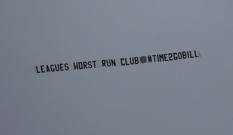 A plane flies over the stadium displaying a message in protest against the Everton owner and board. Reuters