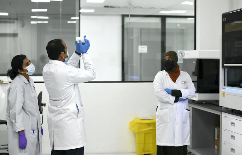 Abu Dhabi, United Arab Emirates - Staff member working at Omics Labs, Masdar City. Khushnum Bhandari for The National