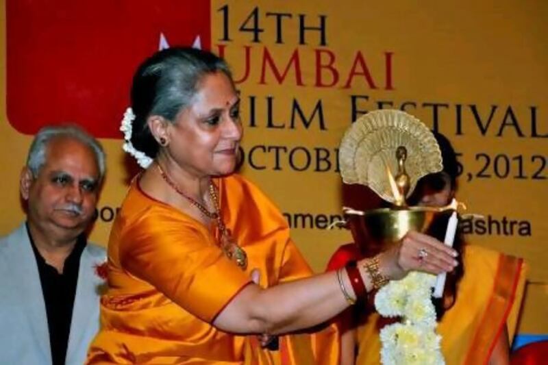 Jaya Bachchan lights a lamp at the opening ceremony of the 14th Mumbai Film Festival. AFP