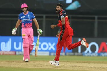 Jos Buttler of Rajasthan Royals is bowled by Mohammed Siraj of Royal Challengers Bangalore during match 16 of the Vivo Indian Premier League 2021 between the Royal Challengers Bangalore and the Rajasthan Royals held at the Wankhede Stadium Mumbai on the 22nd April 2021. Photo by Deepak Malik/ Sportzpics for IPL