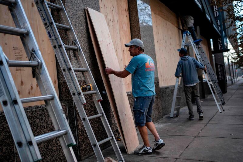 Restaurants and shops downtown are boarded up in preparation for election night unrest on election day in Denver, Colorado.  AFP