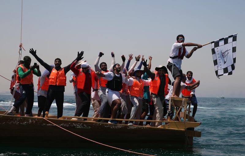 Crew members of the 'Namran', which is owned by Sheikh Zayed bin Hamdan bin Zayed, celebrate at the finish line of the Al Gaffal in Dubai. EPA