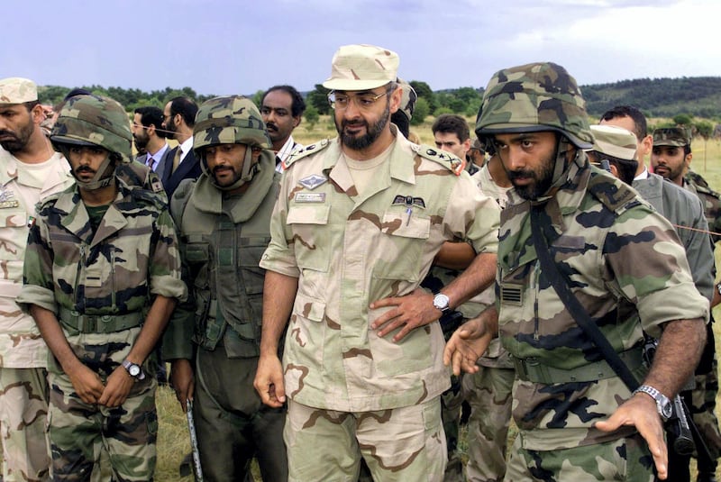 United Arab Emirates chief-of-staff Sheikh Mohamed Bin Zayed Al Nahayan (C) listens 08 July 1999 to UAE officers undergoing a training session in Canjuers, southern France, before going to Kosovo to join KFOR. (Photo by JACK DABAGHIAN / POOL / AFP)