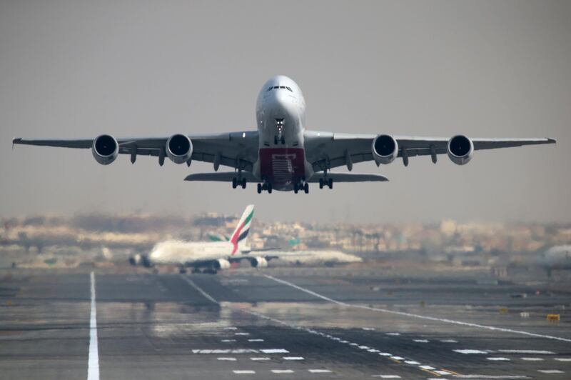FILE PHOTO: An Emirates Airline Airbus A380-800 plane takes off from Dubai International Airport in Dubai, United Arab Emirates February 15, 2019. REUTERS/Christopher Pike/File Photo