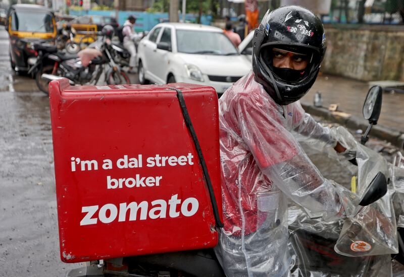A delivery worker of Zomato, an Indian food-delivery startup, prepares to leave to pick up an order from a restaurant in Mumbai. Zomato’s listing comes on the heels of strong food-delivery debuts, including DoorDash and China’s Meituan. REUTERS